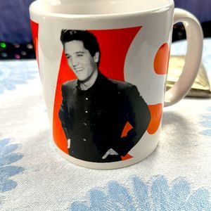 Elvis coffee mug, cup orange, black & white